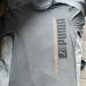 Boys large Puma shirt.